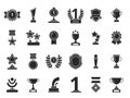 Winners trophies icons. Cups awards medals with ribbons vector black silhouettes isolated Royalty Free Stock Photo