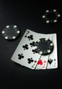 Winning combination of three of a kind or set of cards on a black poker table in a club or casino. Successful poker game concept