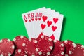 A winning poker combination is Royal Flush. Chips and cards on the green table in the poker club. Luck or Fortune Royalty Free Stock Photo