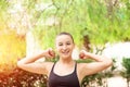 Winning, success concept. Beautiful, fitness sport girl rejoices in victory, raises her hands up. Royalty Free Stock Photo