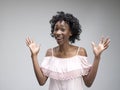 Winning success woman happy ecstatic celebrating being a winner. Dynamic energetic image of female afro model Royalty Free Stock Photo