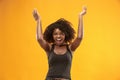 Winning success woman happy ecstatic celebrating being a winner. Dynamic energetic image of female afro model Royalty Free Stock Photo