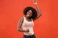 Winning success woman happy ecstatic celebrating being a winner. Dynamic energetic image of female afro model Royalty Free Stock Photo