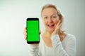 Chroma Key Phone green screen space for advertising Hurray Victory has found Fabulous Photo of a woman in a white T