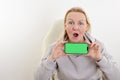 Chroma Key Phone green screen space for advertising Hurray Victory has found Fabulous Photo of a woman in a white T