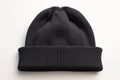 Winter accessory Mens black knitted hat presented against a white background Royalty Free Stock Photo