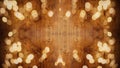 Winter / Advent / christmas Background template - Frame made of golden bokeh lights on brown wooden texture, top view with space Royalty Free Stock Photo