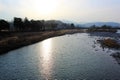 Sunlight reflects on the surface of the Kuma River in Japan