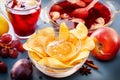 Winter alcoholic drinks - mulled wine, punch, grog with cornflakes Glass glasses with mulled wine. Hot fruit tea