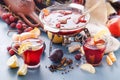 Winter alcoholic drinks - mulled wine, punch, grog. Glass jars with mulled wine. Hot fruit tea. Spices, fruit Royalty Free Stock Photo