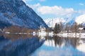 Winter Alpine lake Grundlsee. Embedded in the wonderful mountain massif of the Dead Mountains. Clear cold landscape with blue sky