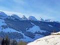 Winter alpine snow peaks of the Churfirsten mountain range between Lake Walenstadt or Lake Walen Walensee and the Thur valley Royalty Free Stock Photo