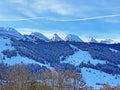 Winter alpine snow peaks of the Churfirsten mountain range between Lake Walenstadt or Lake Walen Walensee and the Thur valley Royalty Free Stock Photo