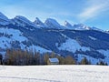 Winter alpine snow peaks of the Churfirsten mountain range between Lake Walenstadt or Lake Walen Walensee and the Thur valley Royalty Free Stock Photo