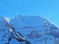 Winter ambience and beautiful idyllic atmosphere on the steep alpine rocky peak LÃÂ¼tispitz or Luetispitz / 1986 m.a.s.l.