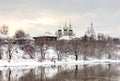 Winter in the ancient Russian city. Churches and ancient house Royalty Free Stock Photo