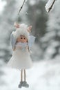 Winter angel.Christmas and New Years time. angel on a tree. Snow fairy. Christmas tree toy.