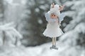 Winter angel.Christmas and New Years time.Christmas angel on a tree. Snow fairy. Christmas tree toy.