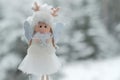 Winter angel.Christmas and New Years time.Christmas angel on a tree. Christmas tree toy.