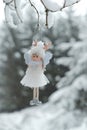 Winter angel.Christmas and New Years time.Christmas angel on a tree. Snow fairy. Christmas toy.