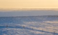 Winter arctic landscape. The car drives on the road in the tundra. Royalty Free Stock Photo