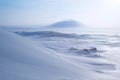 Winter arctic landscape with snow covered tundra and hills