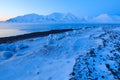 Winter Arctic. White snowy mountain, blue glacier Svalbard, Norway. Ice in ocean. Iceberg twilight in North pole. Beautiful landsc