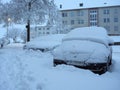 Winter attack in Germany. Heavy snowfall in NRW in the Mettmann county. Snow-covered roads and cars