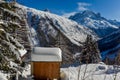 Winter aura in the Alps, beautiful view of the cottage - mountains, trees in snow, Mont Blanc du Tacul, Chamonix, France Royalty Free Stock Photo