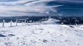 Winter austrian mountains panorama with blue sky and clouds