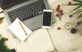 Winter, autumn workspace composition, laptop mock-up flat lay design, background of knitted sweaters, decoration, smart phone