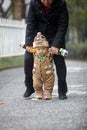 Winter baby walking Royalty Free Stock Photo