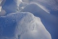 Winter background. Abstract. Snow drifts. Smooth transitions of lines of light and shadow. Snow on a sunny day Royalty Free Stock Photo