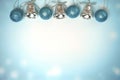 Cyan christmas ball and bell - Winter background Royalty Free Stock Photo