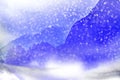 Winter background. Falling snow in the mountains. Royalty Free Stock Photo