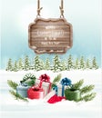Winter background with gift boxes and a wooden ornate Royalty Free Stock Photo