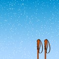 Winter background with old ski poles