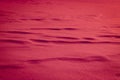 Winter background, red snow, Christmas theme, snow texture with copy space Royalty Free Stock Photo