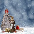 Winter background with a snowman and Christmas trees