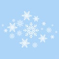 Winter background. White Snowflakes on blue background. Greeting card