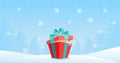 Winter banner with copy space. Red gift box on a background of a winter landscape with snowflakes, Merry Christmas. Flat Royalty Free Stock Photo