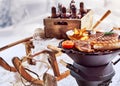 Winter barbecue outdoors in the snow Royalty Free Stock Photo