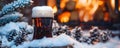 A winter beer scene with a stout beer, snow-covered branches, and a cozy winter setting with a Royalty Free Stock Photo
