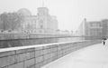 Winter in Berlin City with walking People and The Reichstag building