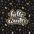 Winter black background with stars and moons and hand drawn words hello winter