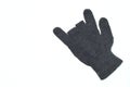 Winter black gloves on white background.