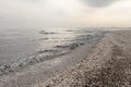Winter black sea beach in winter sky landscape Royalty Free Stock Photo