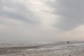 Winter black sea beach in winter sky landscape Royalty Free Stock Photo
