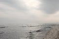Winter black sea beach in winter sky landscape Royalty Free Stock Photo