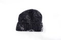 Winter black warm hat on a snow Royalty Free Stock Photo